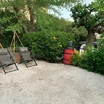 Les Dahlias 4 Personnes Jacuzzi Barbecue Jardin Arbore Climatise Apartamento Agde